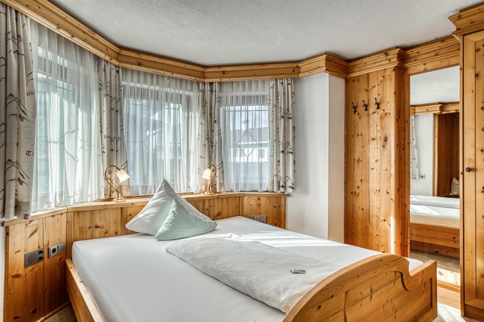 Hotel Alpenstolz มีเดอร์ส ห้อง รูปภาพ